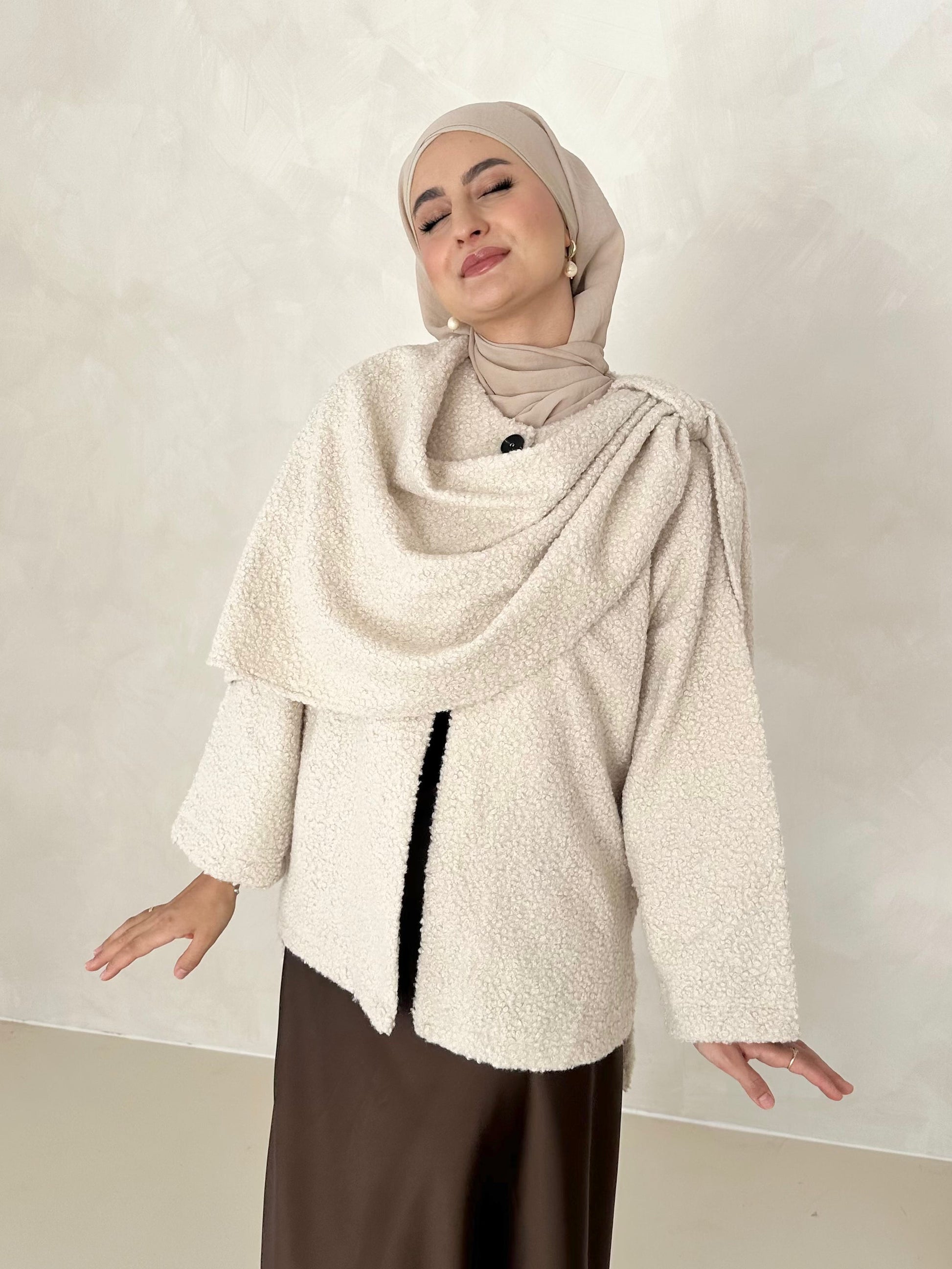 Manteau Teddy avec écharpe intégrée