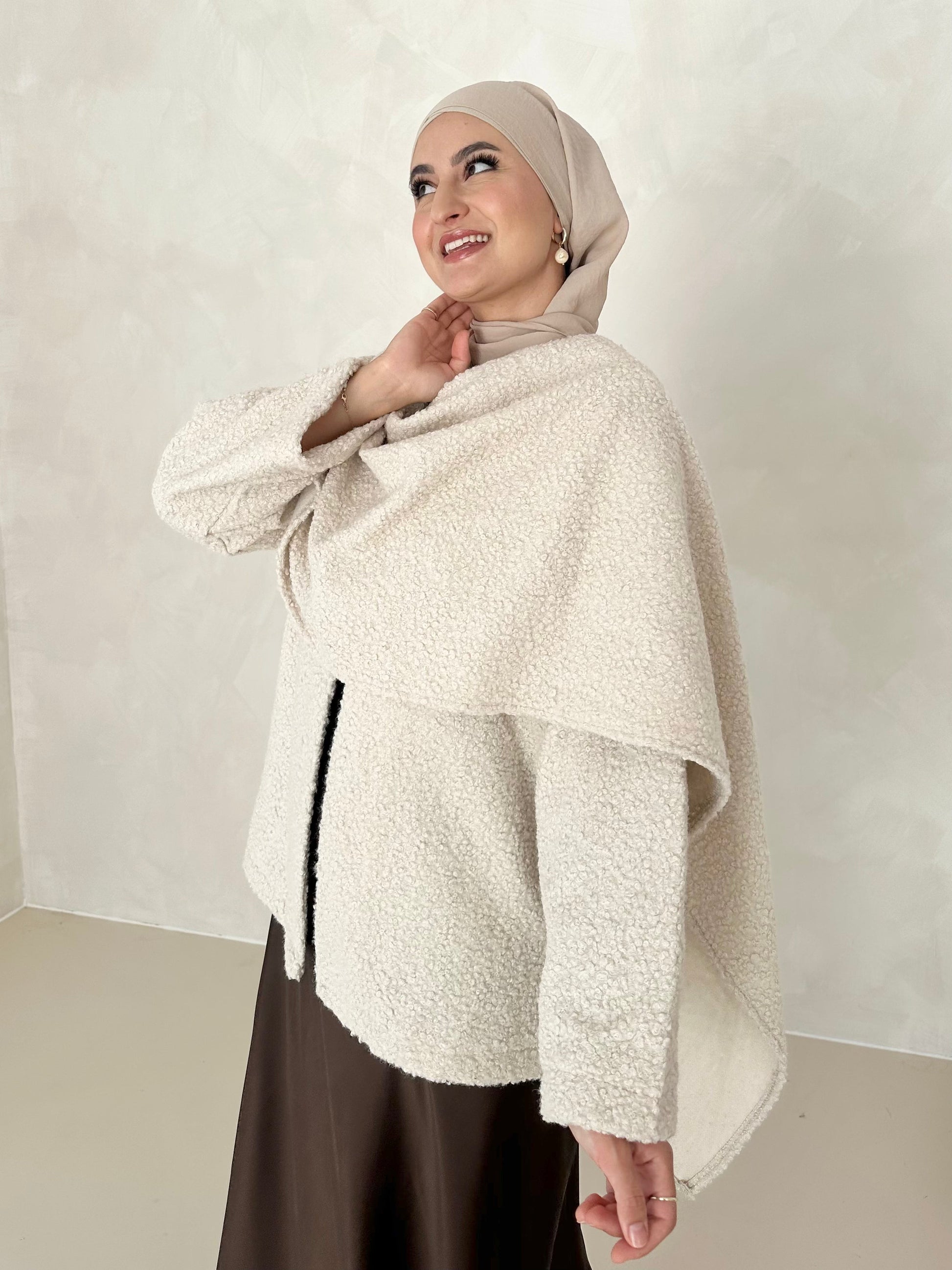 Manteau Teddy avec écharpe intégrée