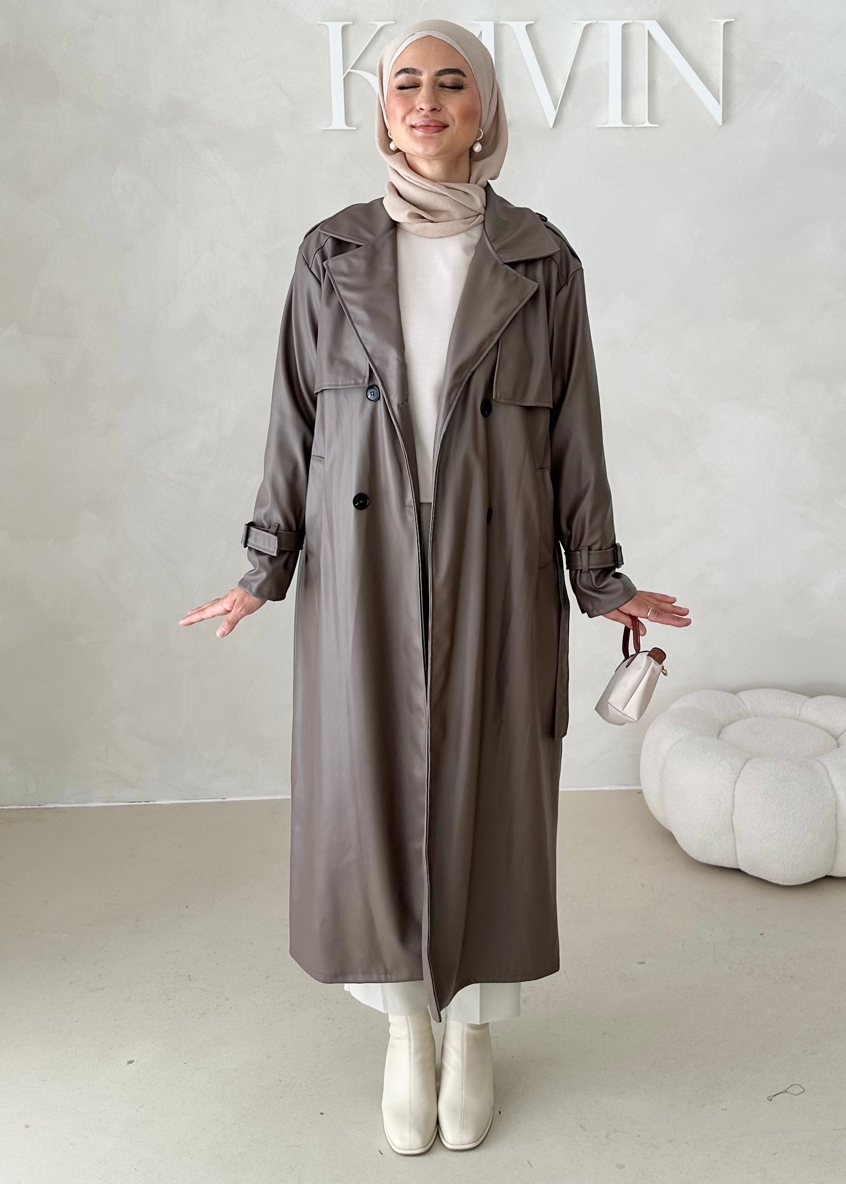 Trench aspect cuir