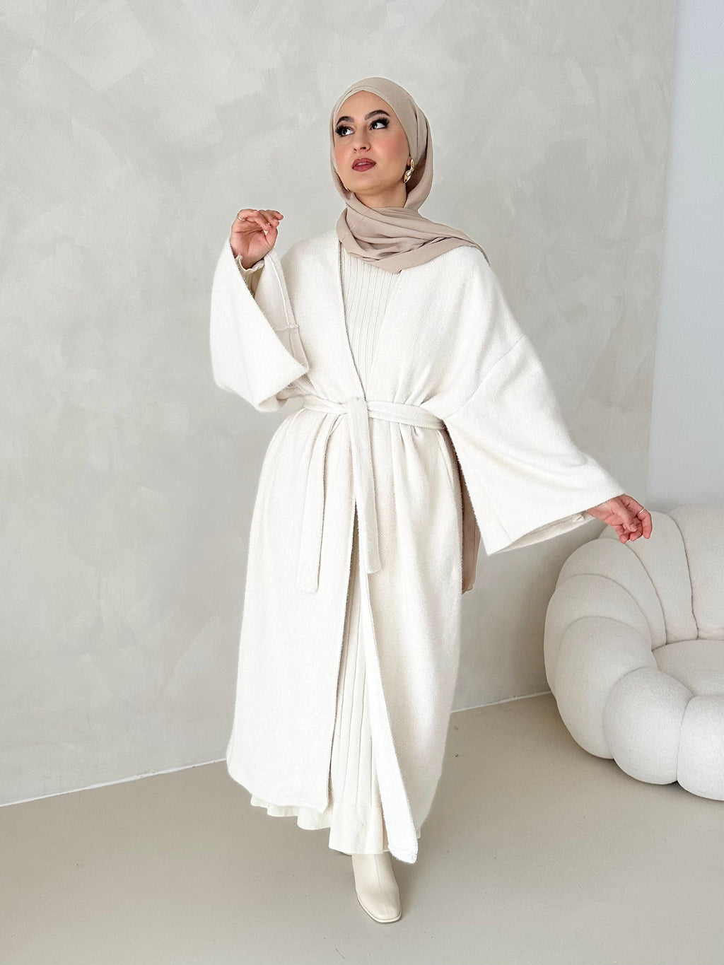 Manteau douillet avec ceinture