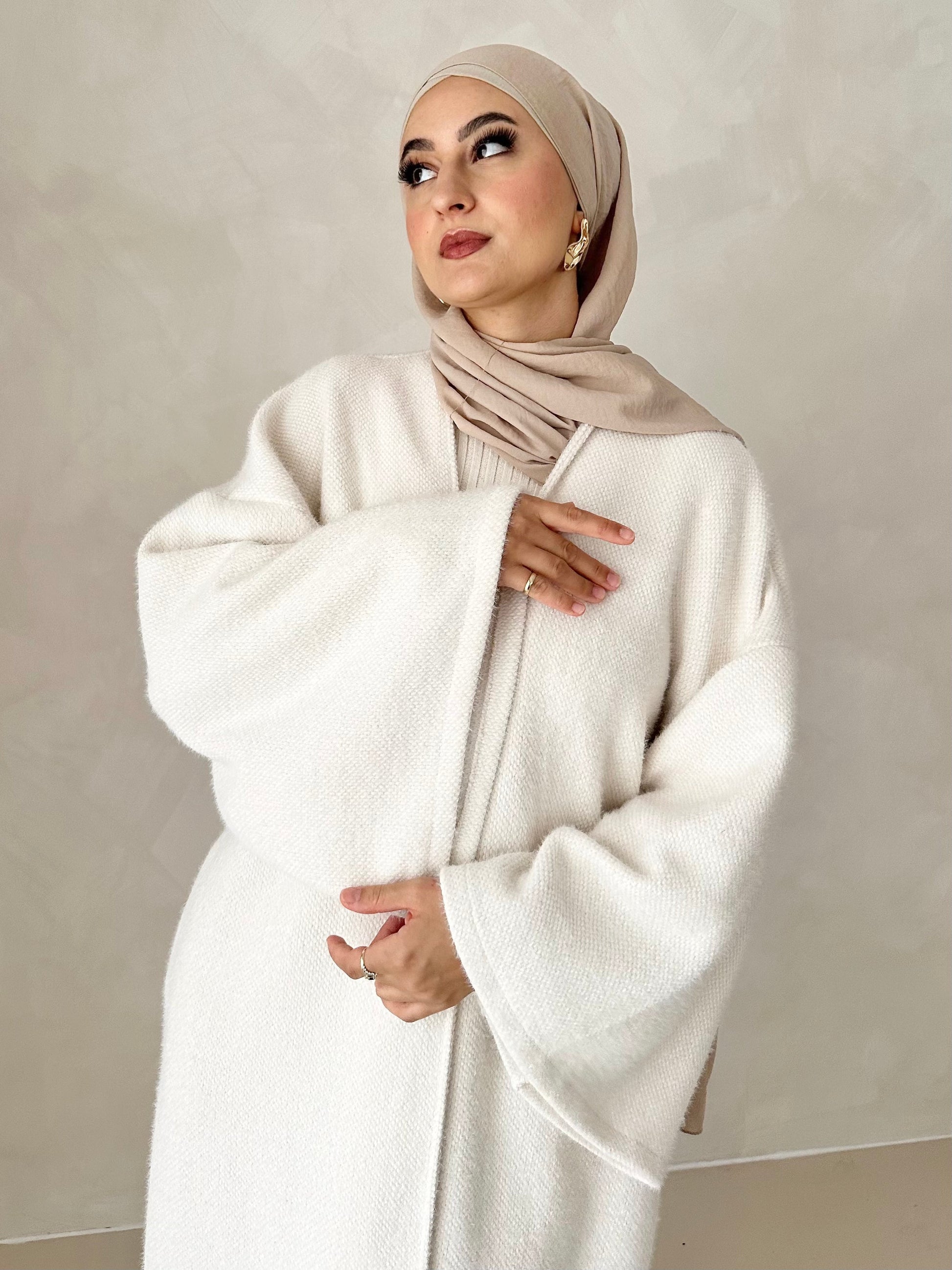 Manteau douillet avec ceinture