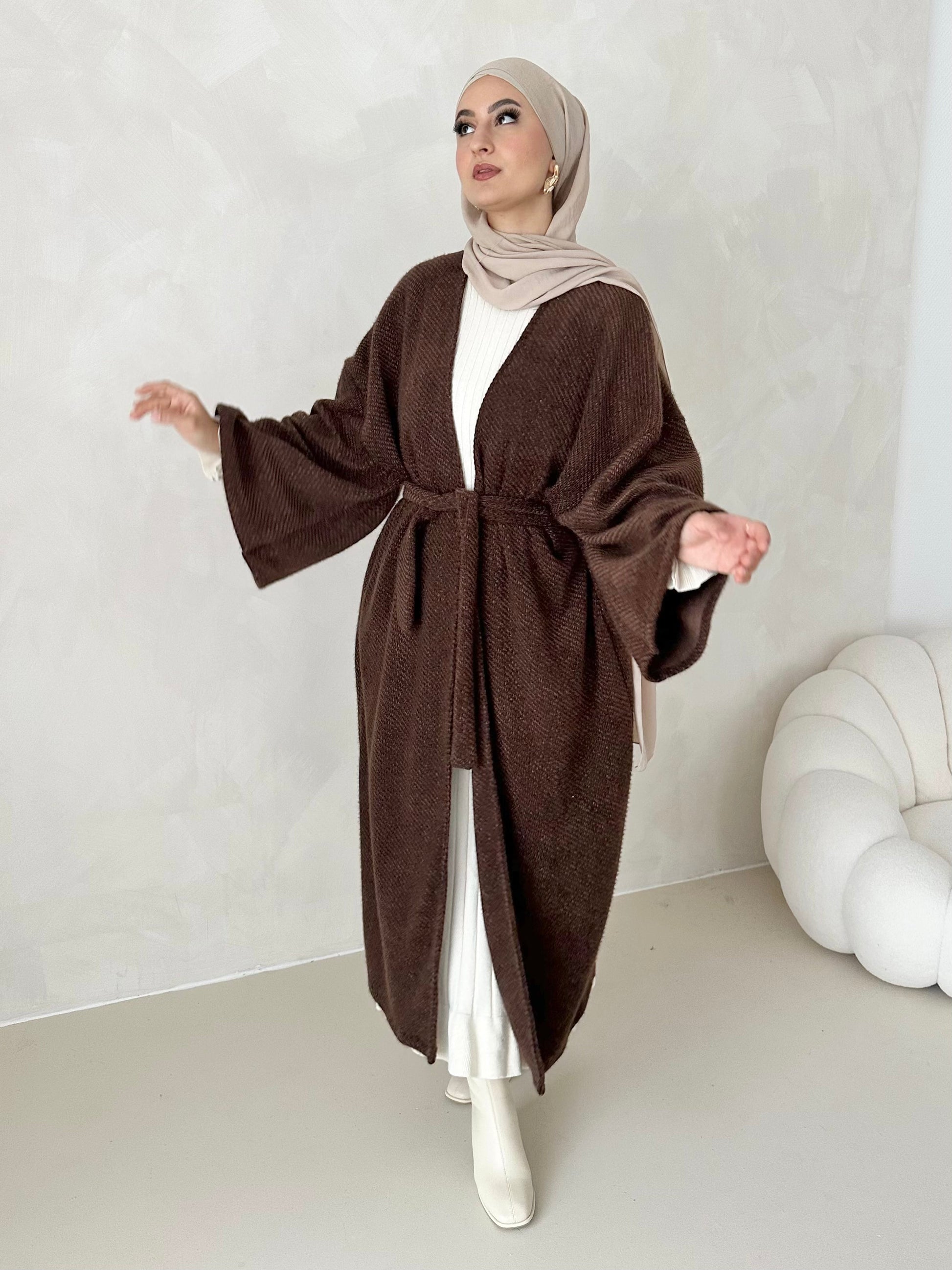 Manteau douillet avec ceinture