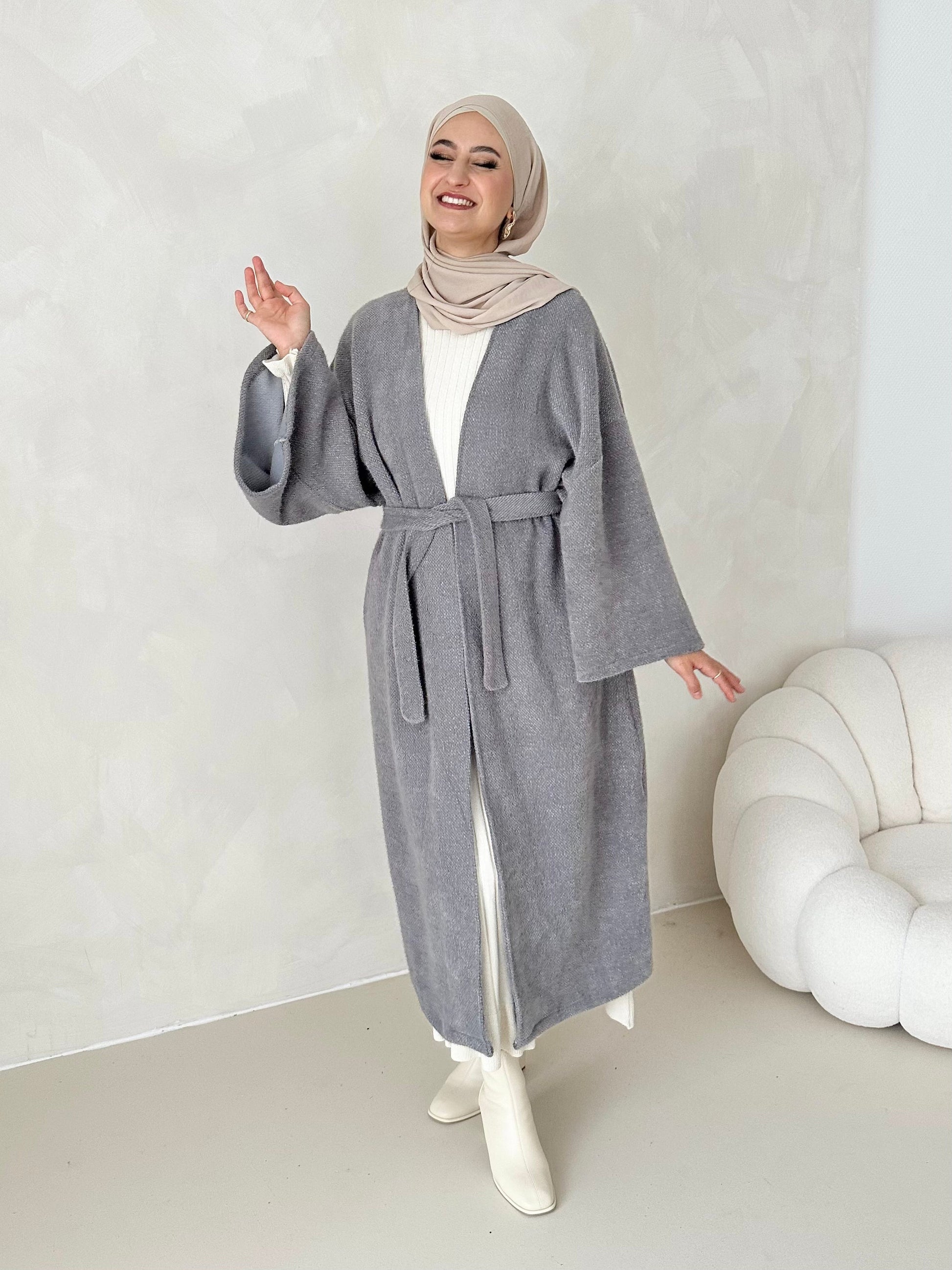 Manteau douillet avec ceinture