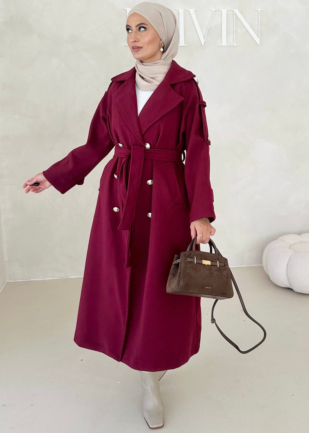 Manteau avec boutons dorés