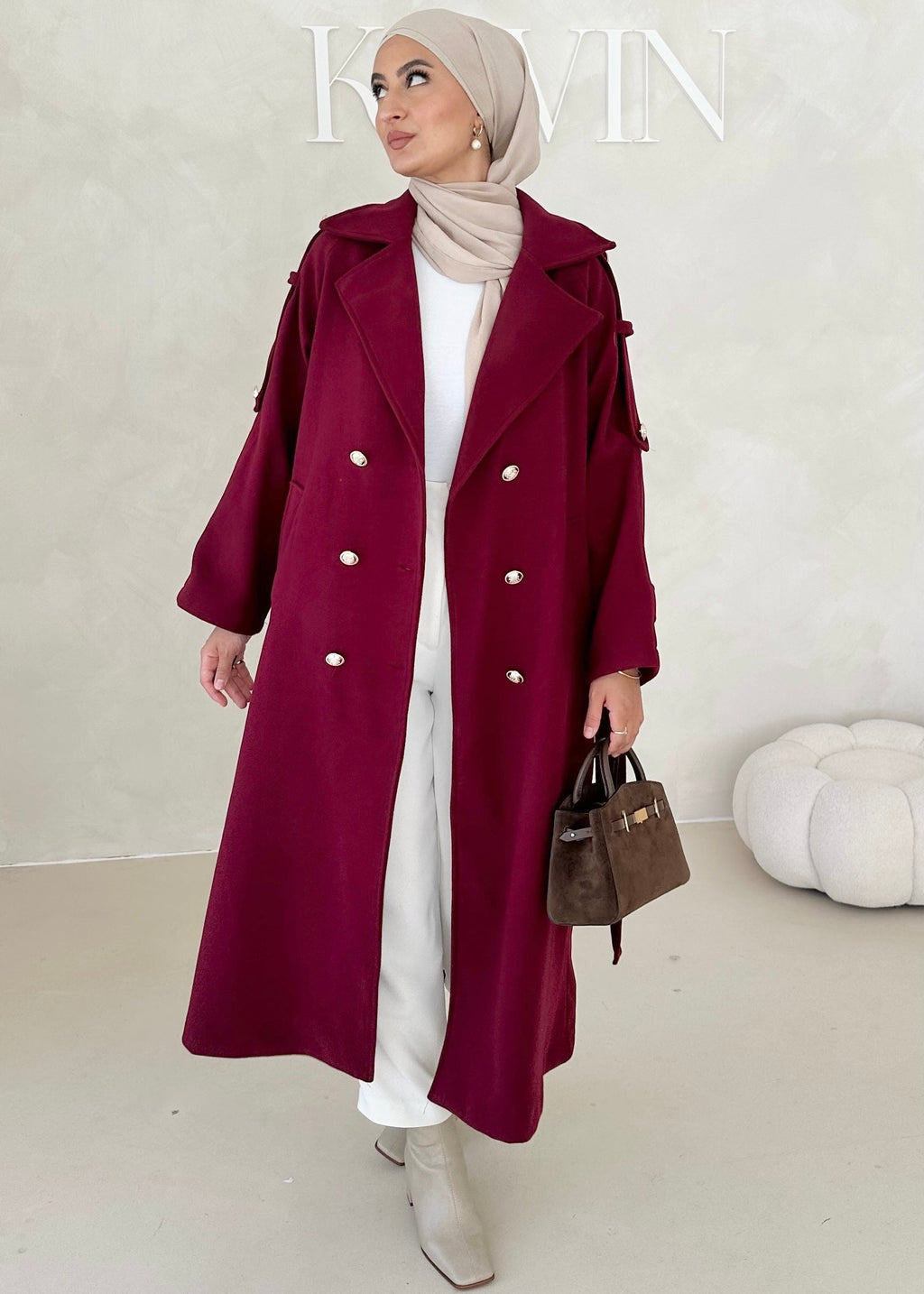 Manteau avec boutons dorés