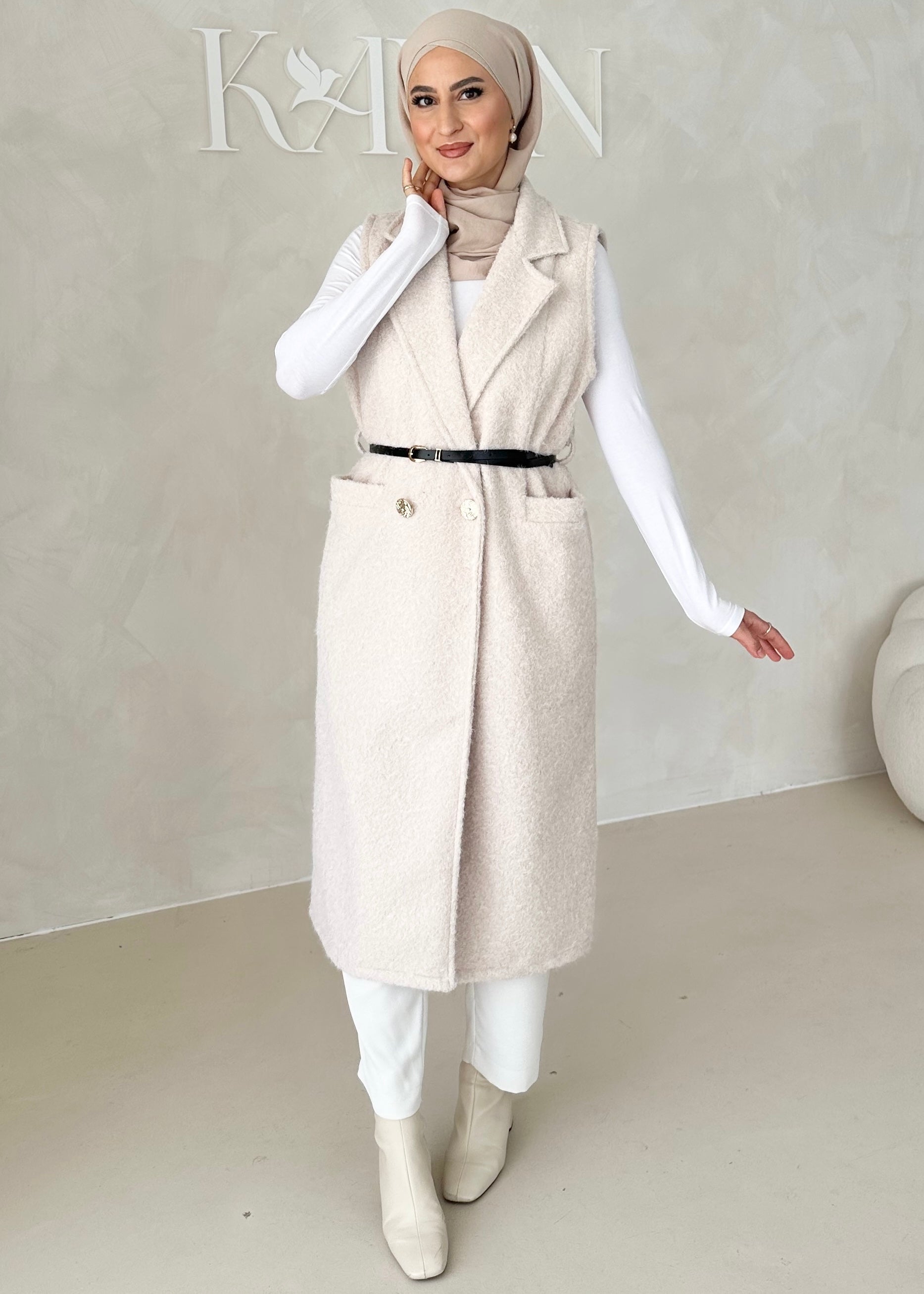 Gilet sans manches avec ceinture