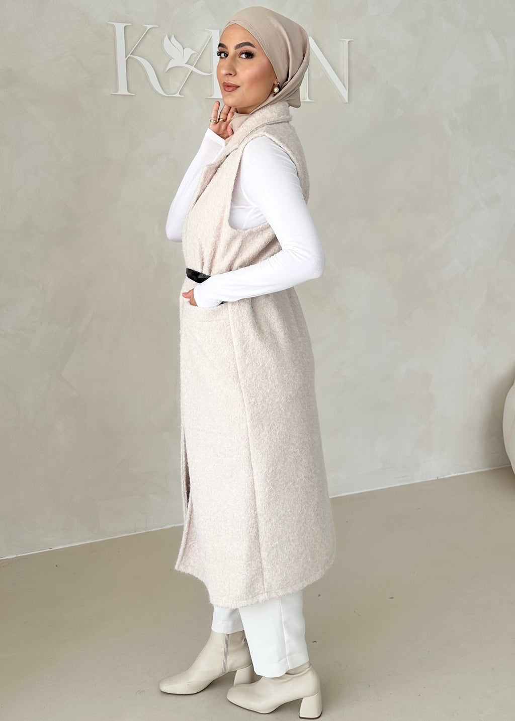 Gilet sans manches avec ceinture