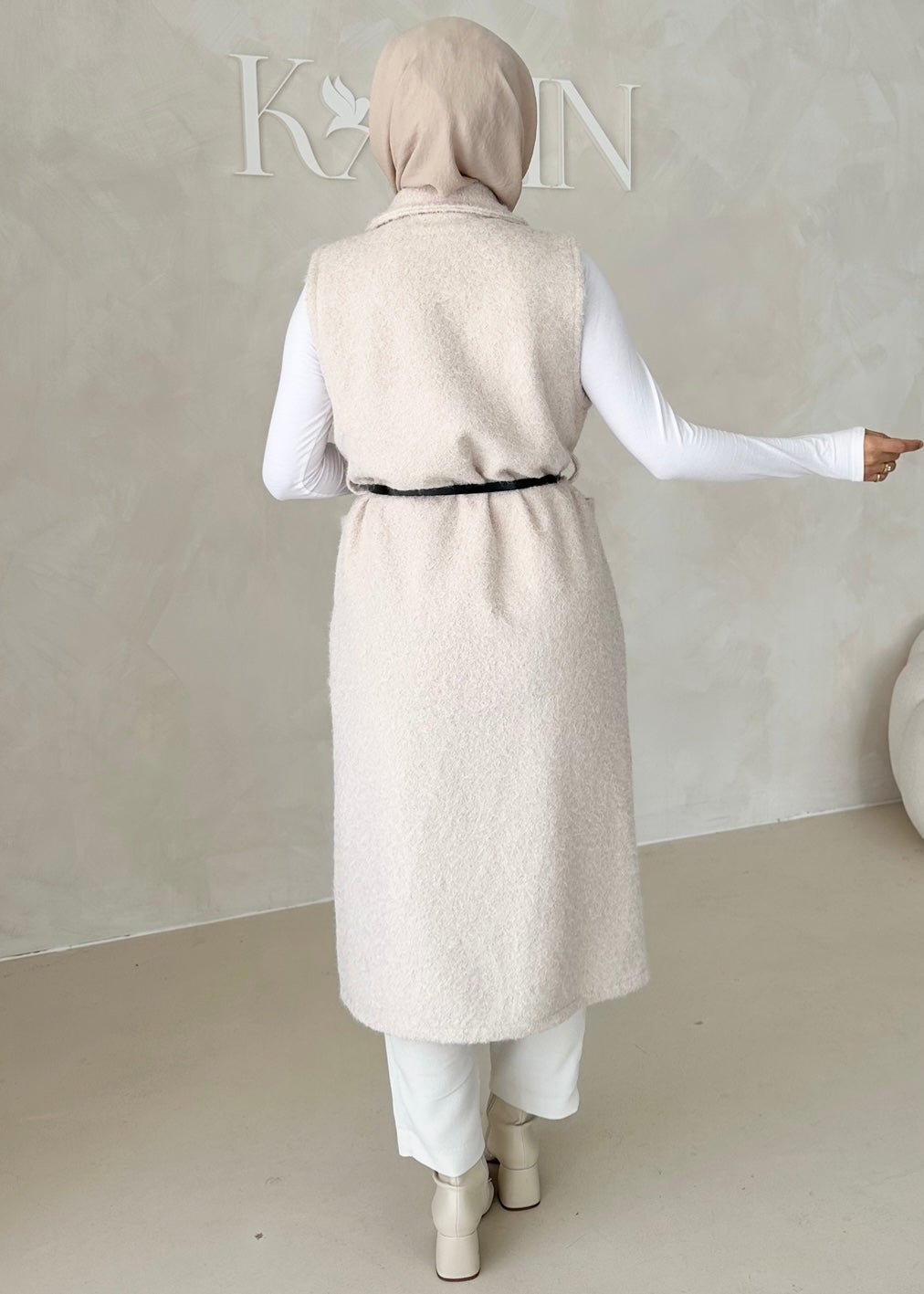 Gilet sans manches avec ceinture