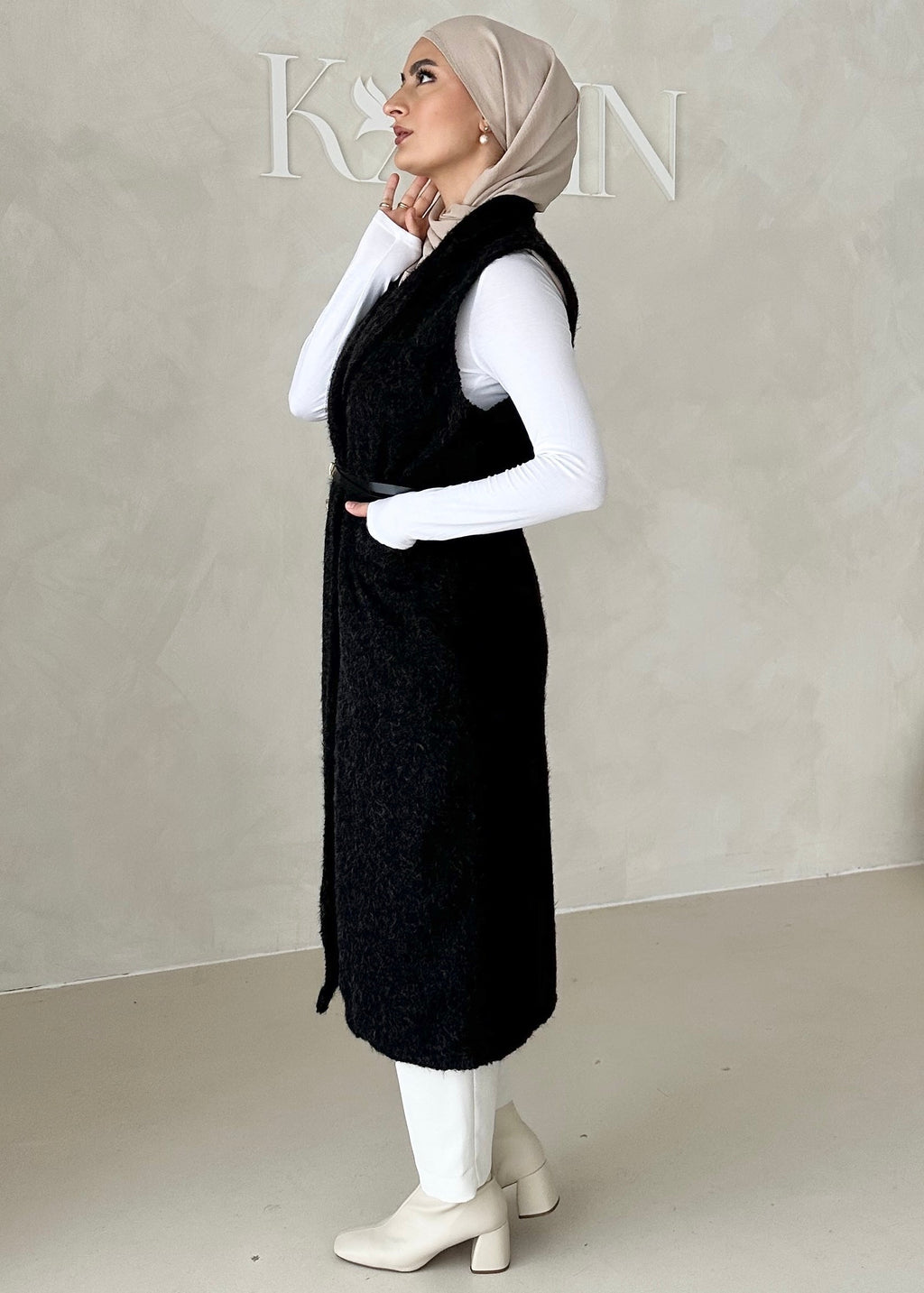 Gilet sans manches avec ceinture