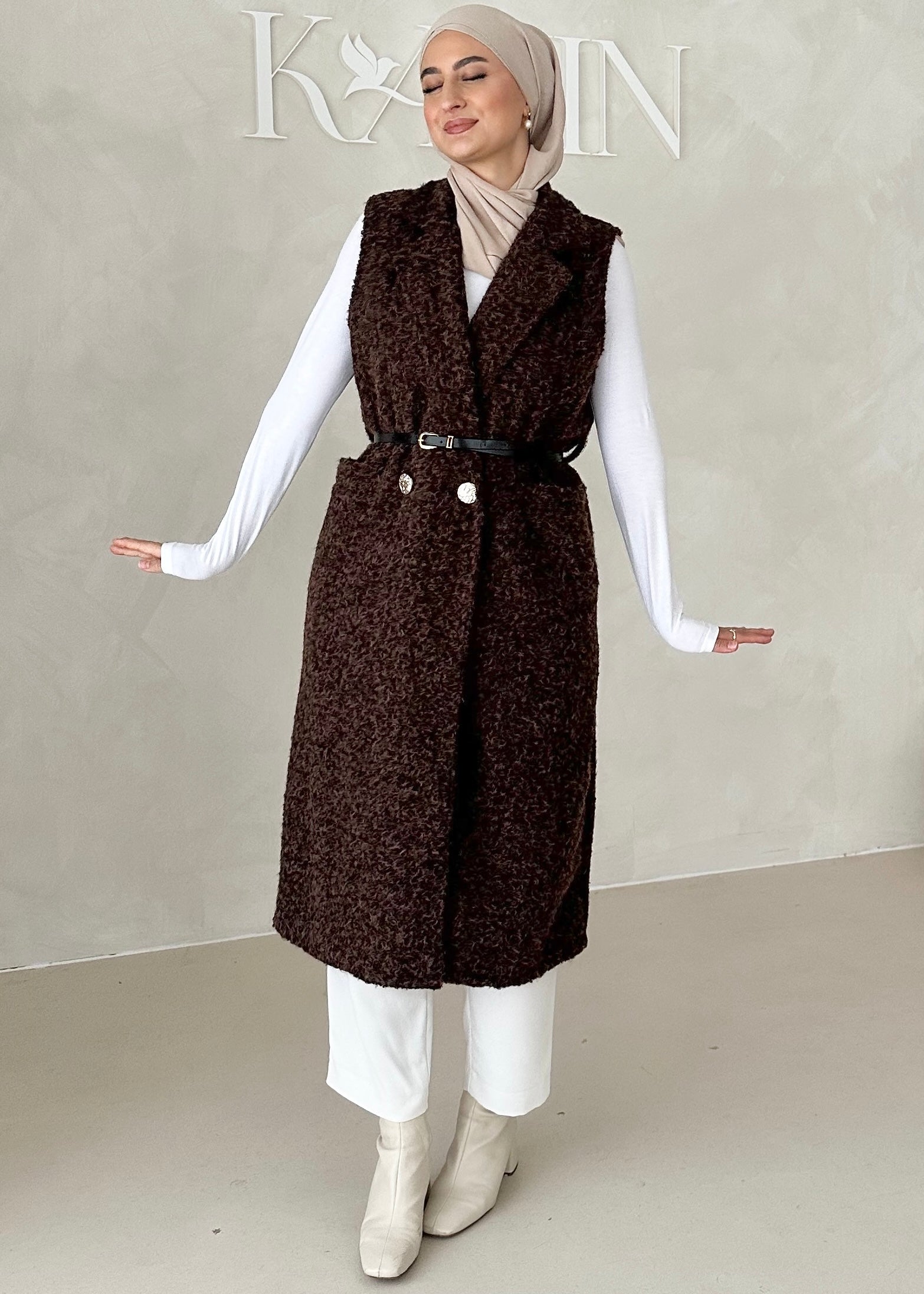 Gilet sans manches avec ceinture