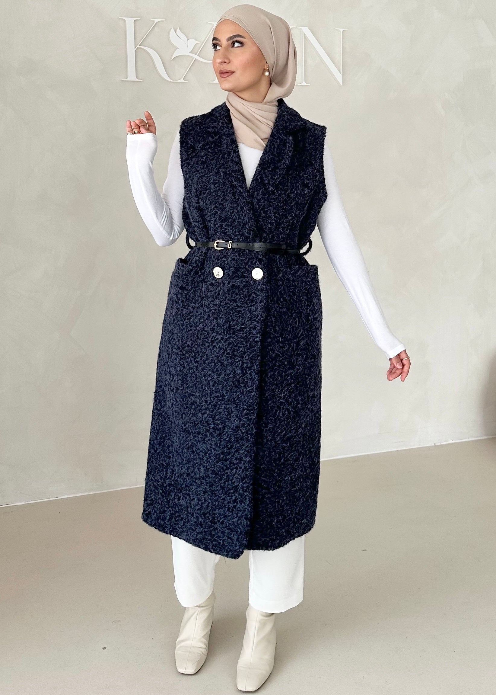 Gilet sans manches avec ceinture