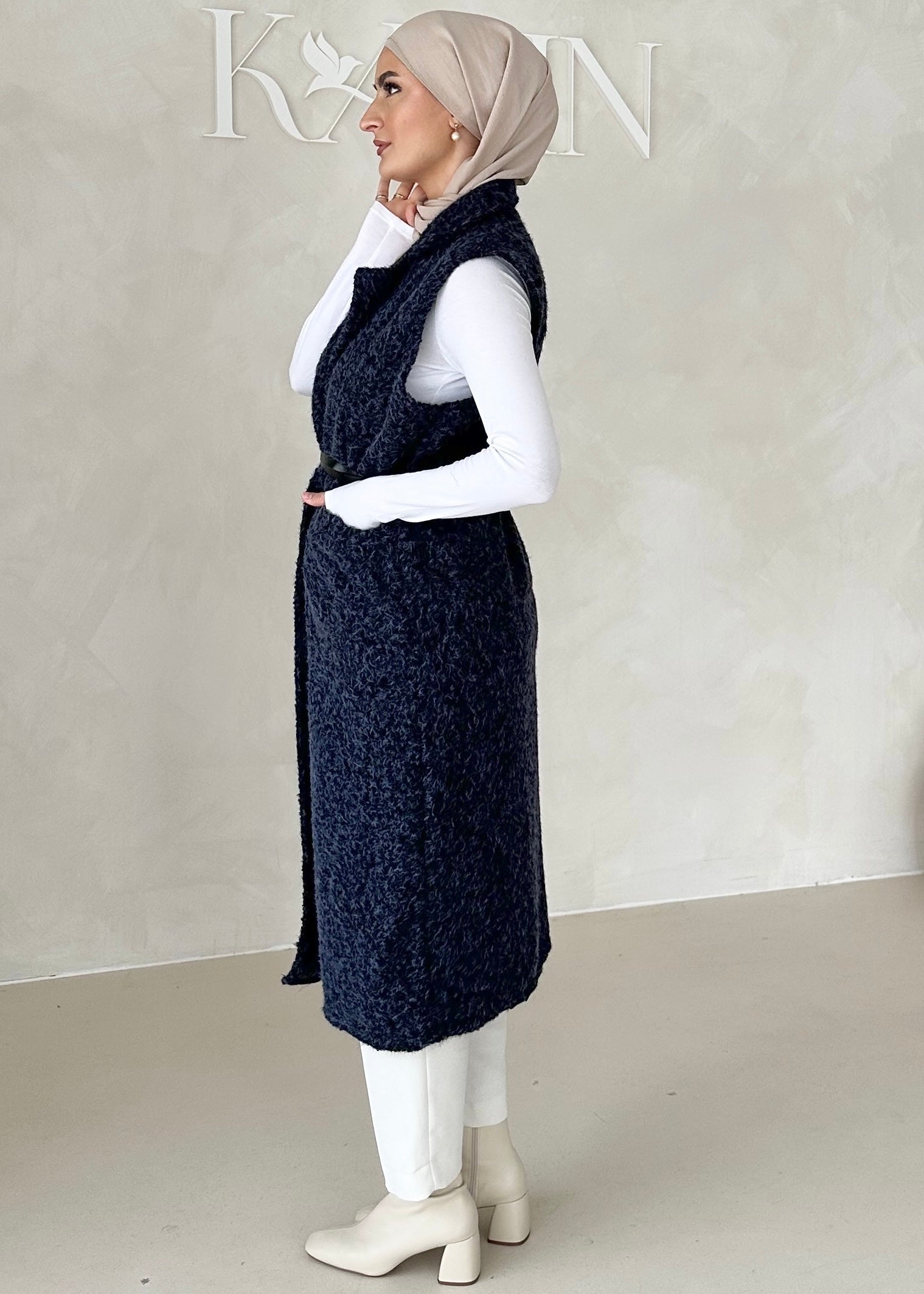 Gilet sans manches avec ceinture