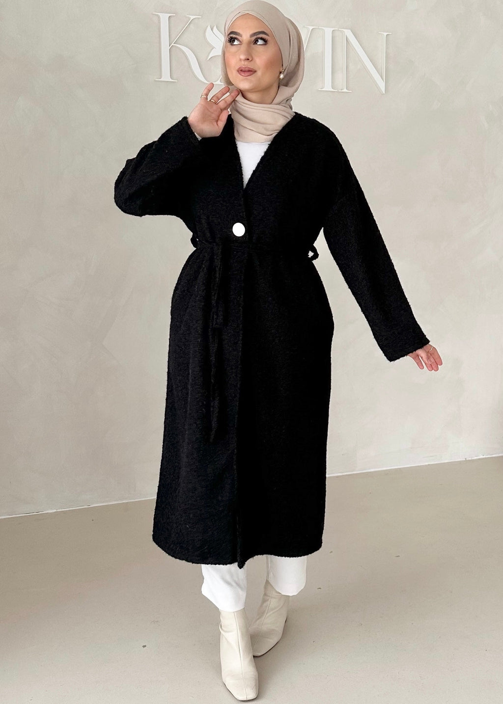 Manteau avec ceinture à nouer