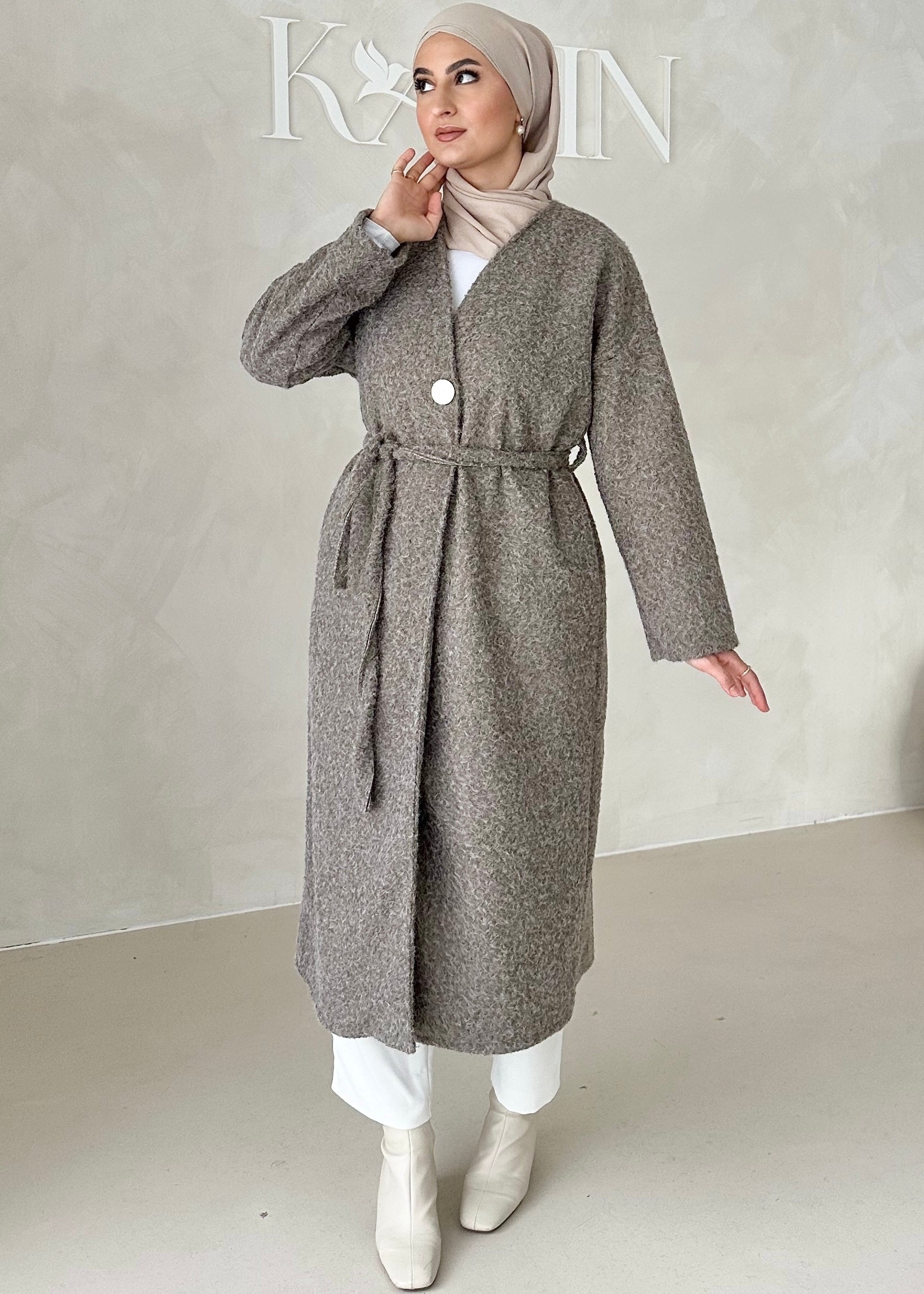 Manteau avec ceinture à nouer