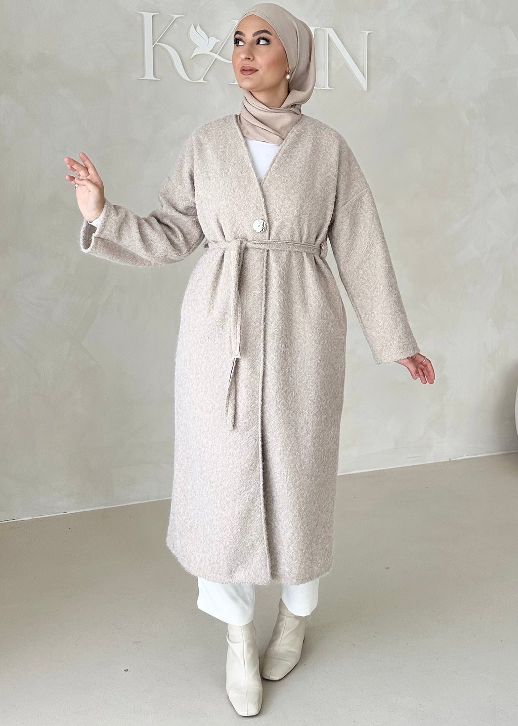 Manteau avec ceinture à nouer