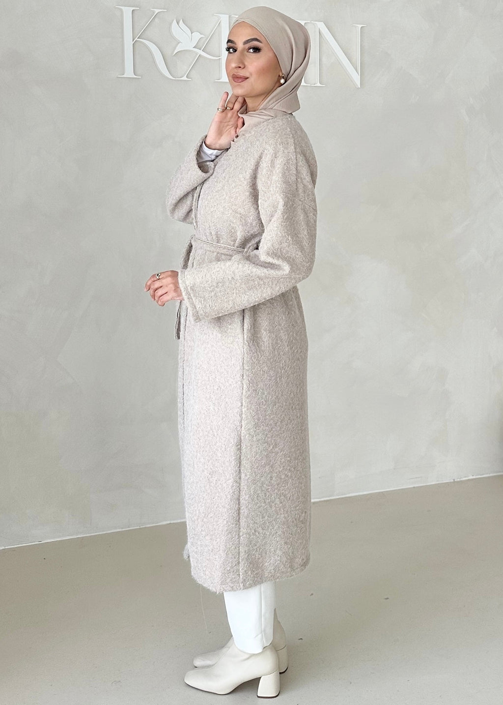 Manteau avec ceinture à nouer