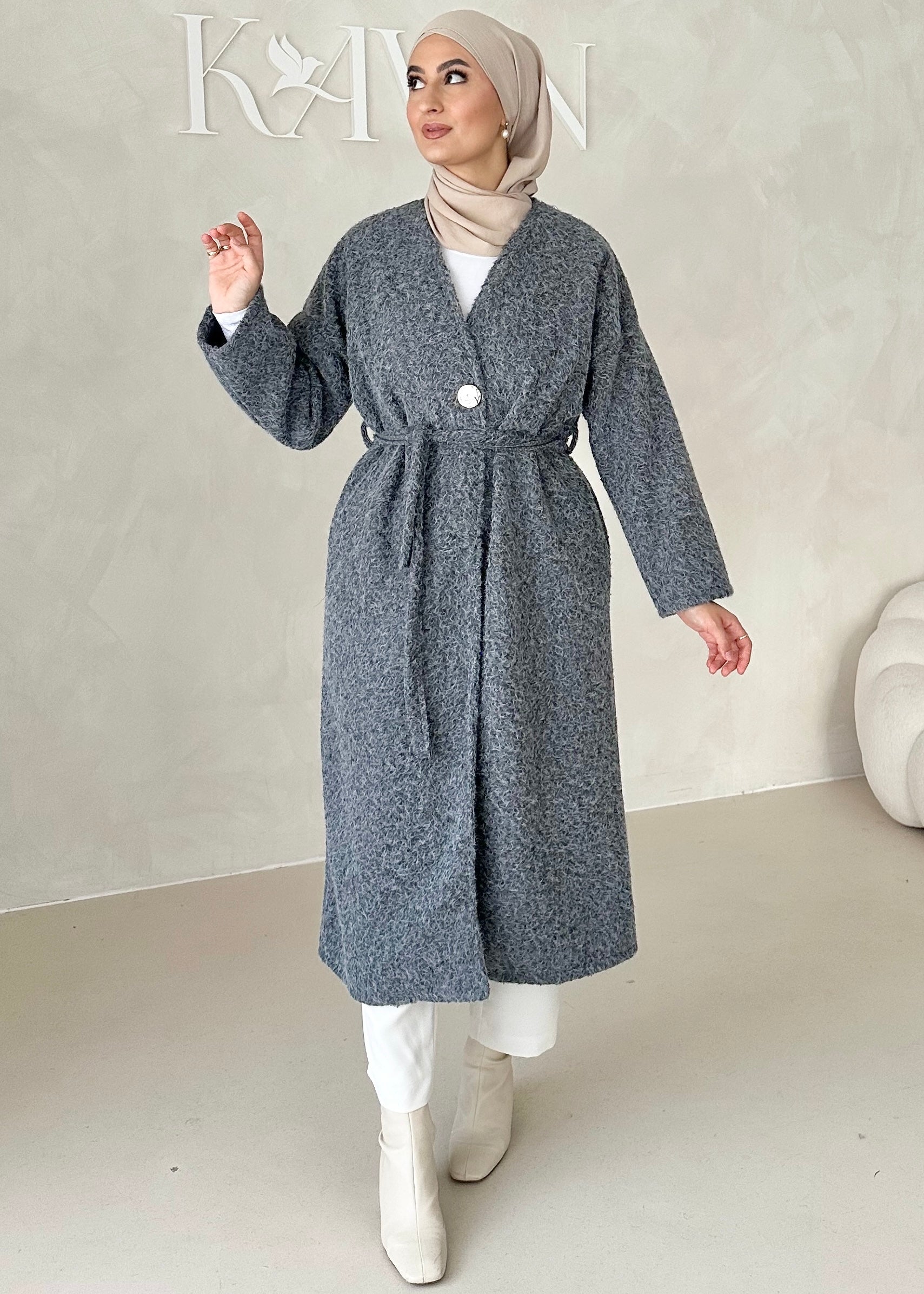 Manteau avec ceinture à nouer