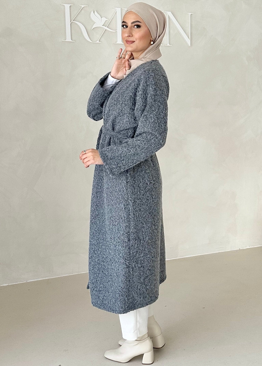 Manteau avec ceinture à nouer