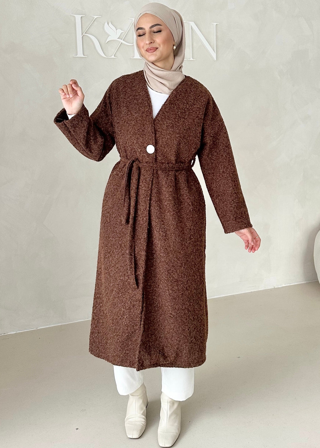 Manteau avec ceinture à nouer