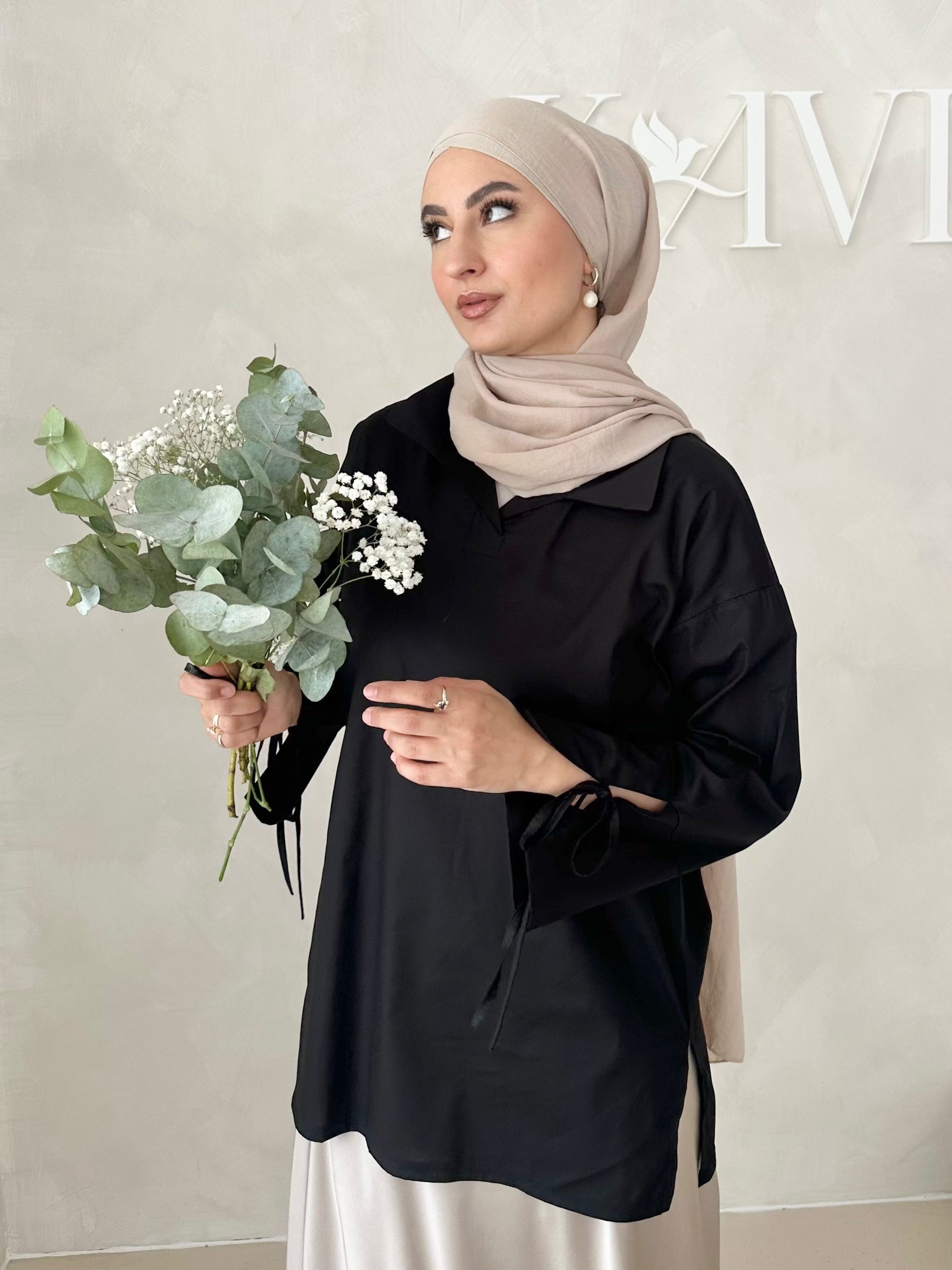 Blouse basique avec détail laçage