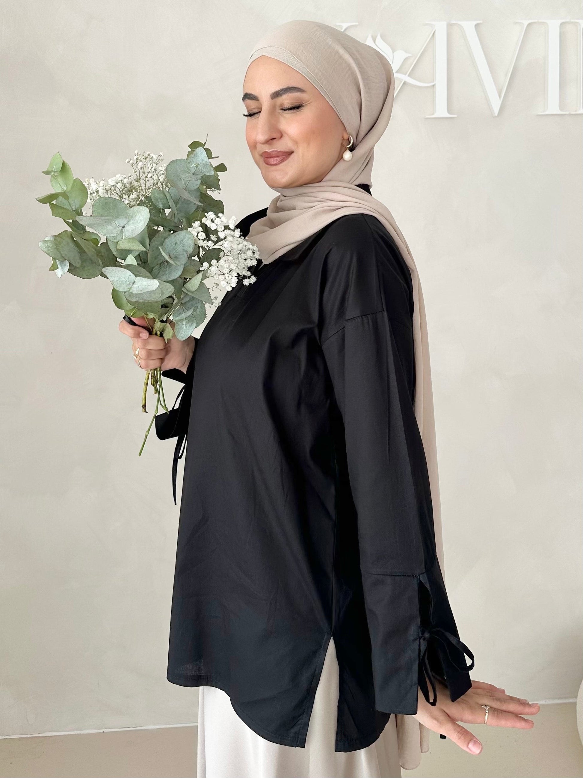 Blouse basique avec détail laçage