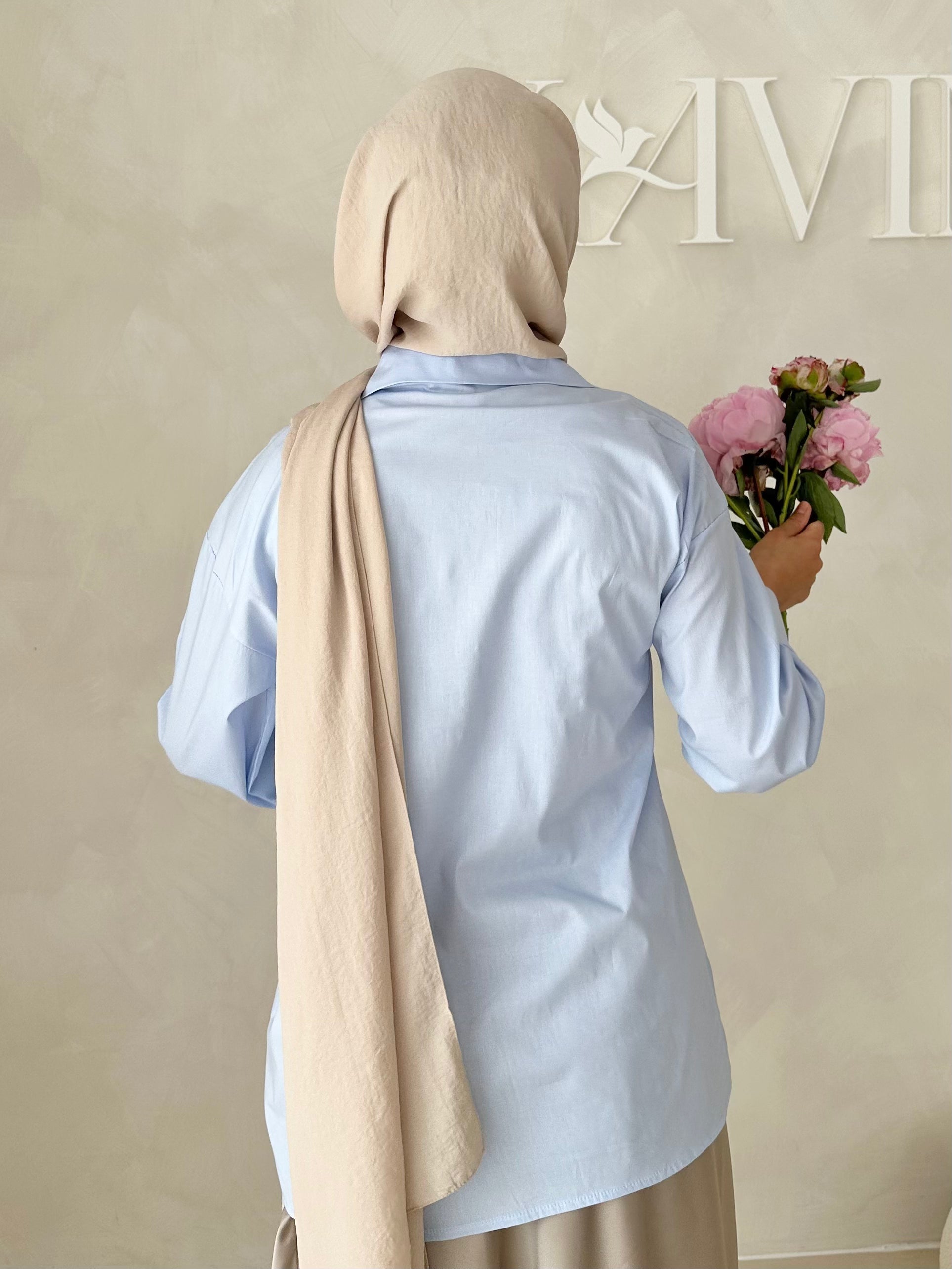 Blouse basique avec détail laçage